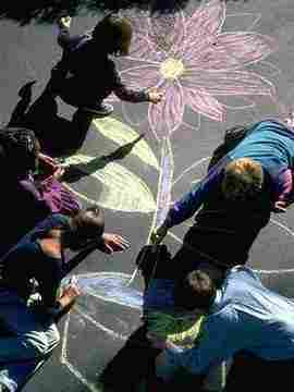 photo of kids drawing flowers